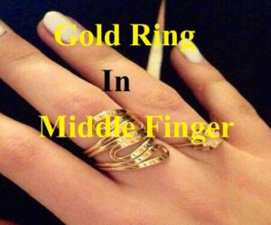 Gold Ring In Middle Finger