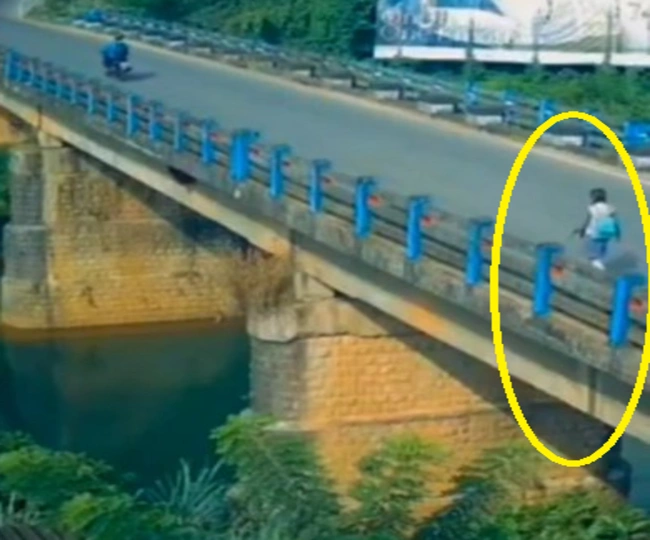 Girl student returning from school jumps into river