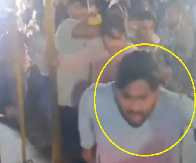 Several boys together beat up a young man